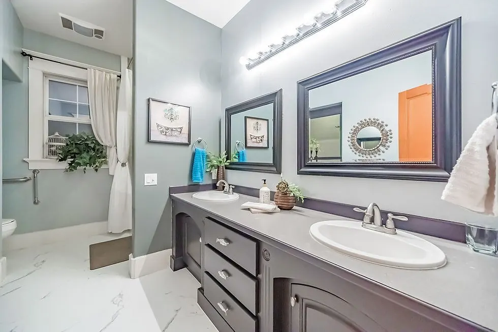 The ADA bathroom at The Grayson, a double vanity with lower counters